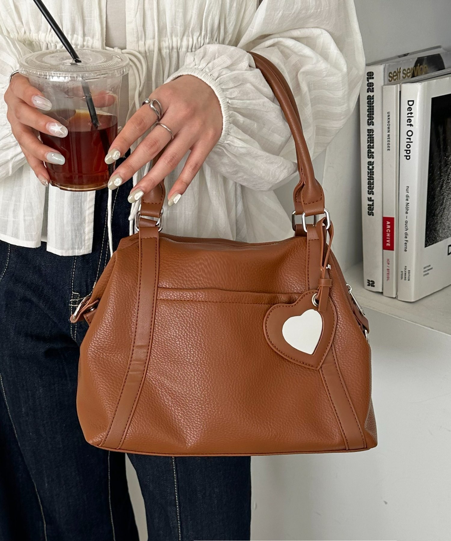 Discoat｜ミラーチャーム付ソフトボストンバッグ | Rakuten Fashion