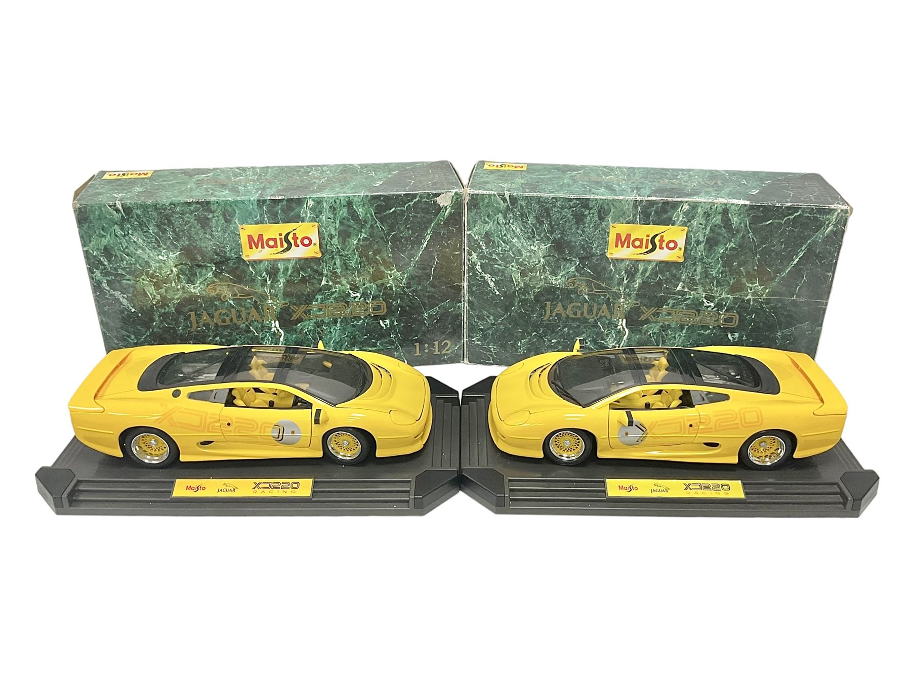 Two Maisto 1:12 scale Jaguar XJ220 'Racing' cars in yellow | Toys