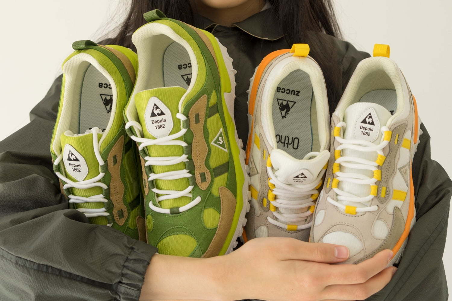 ズッカ × ルコックスポルティフのスニーカー、オレンジなどビタミン