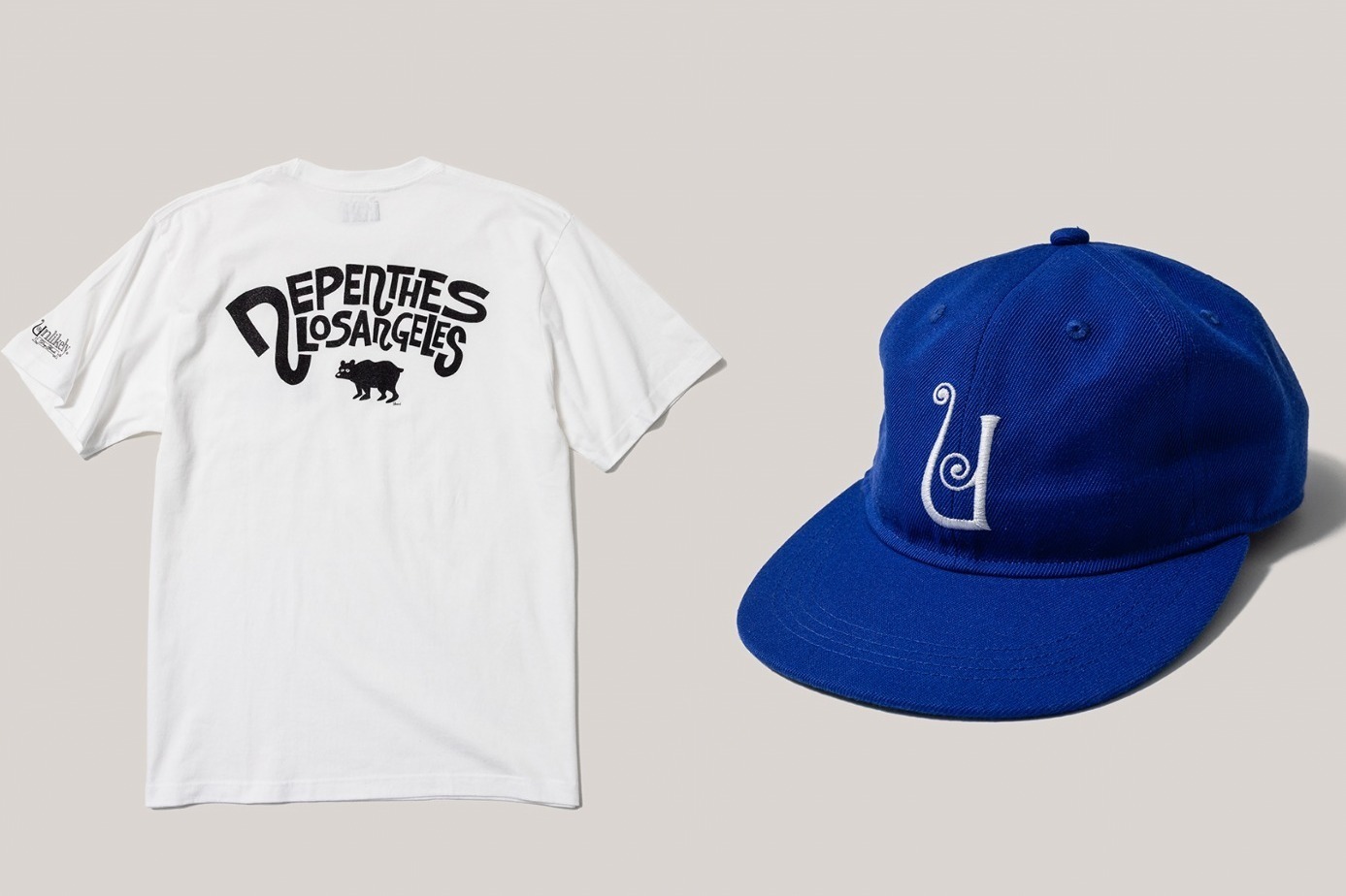 ネペンテス ロサンゼルス×アンライクリー、逆さ“Nロゴ”の青キャップ