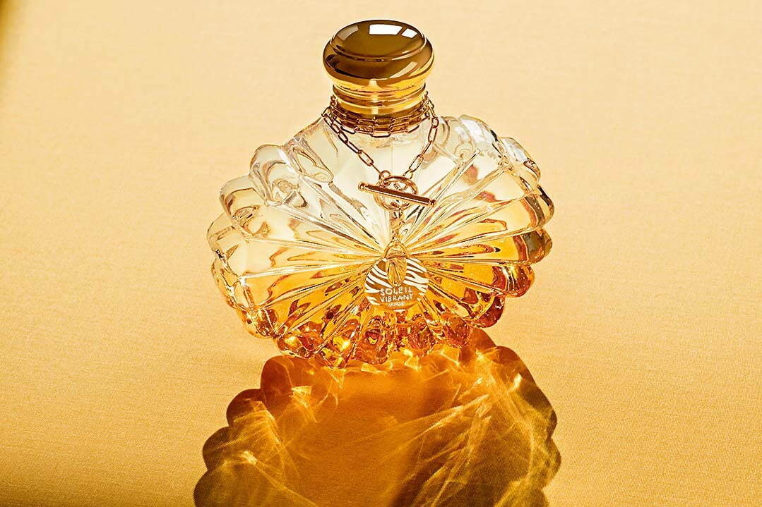 ラリック“輝く太陽”着想の新作フレグランス、褐色グラデカラーの放射状