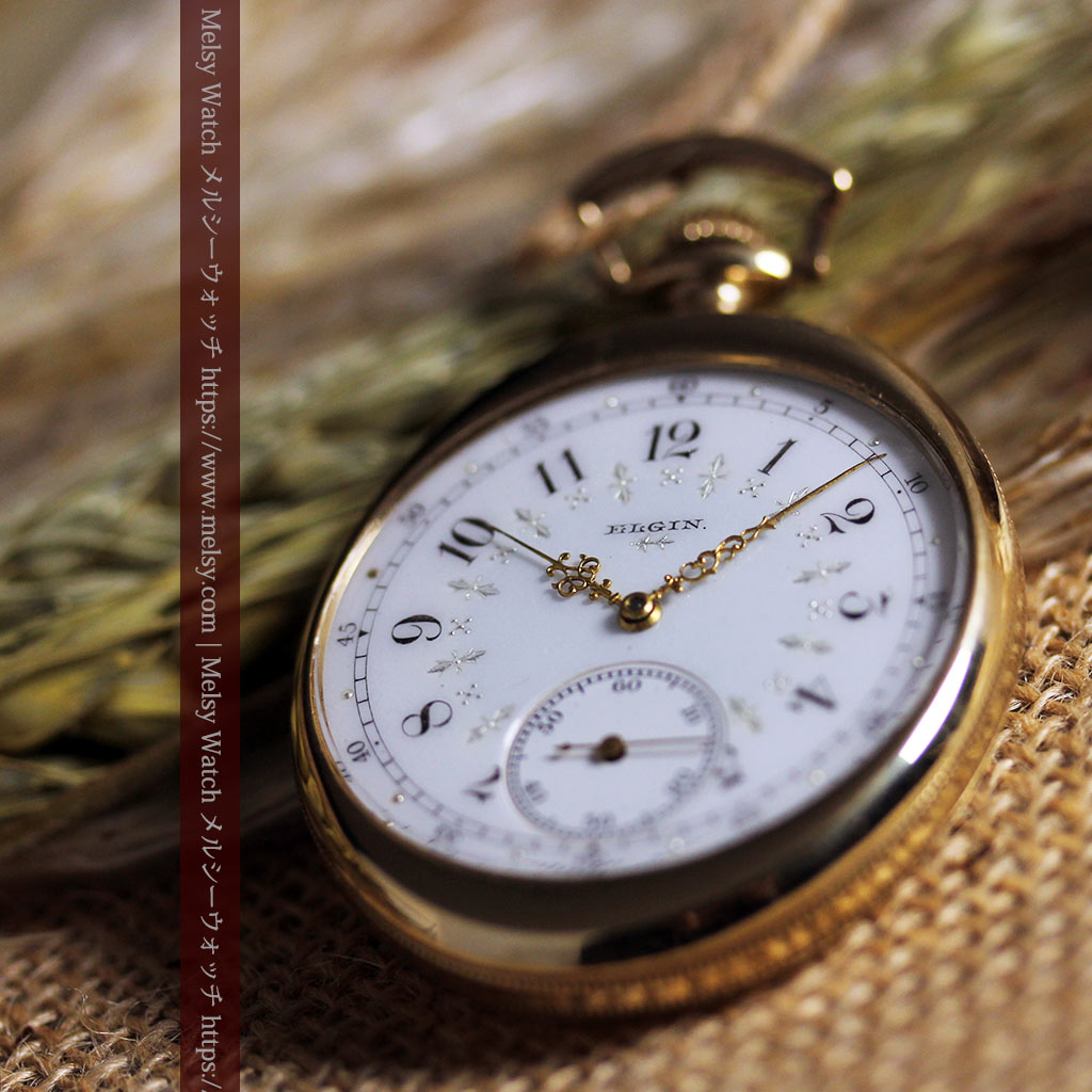 エルジンのアンティーク懐中時計 縦長の楕円形と雪花の文字盤