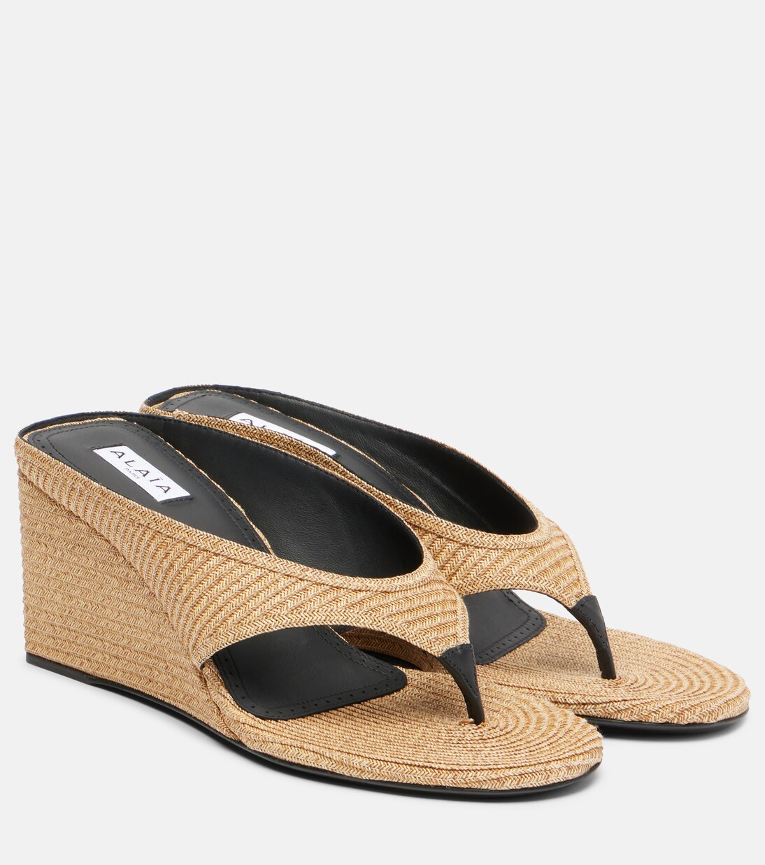 Cube 75 woven wedge thong sandals in beige - Alaia | Mytheresa