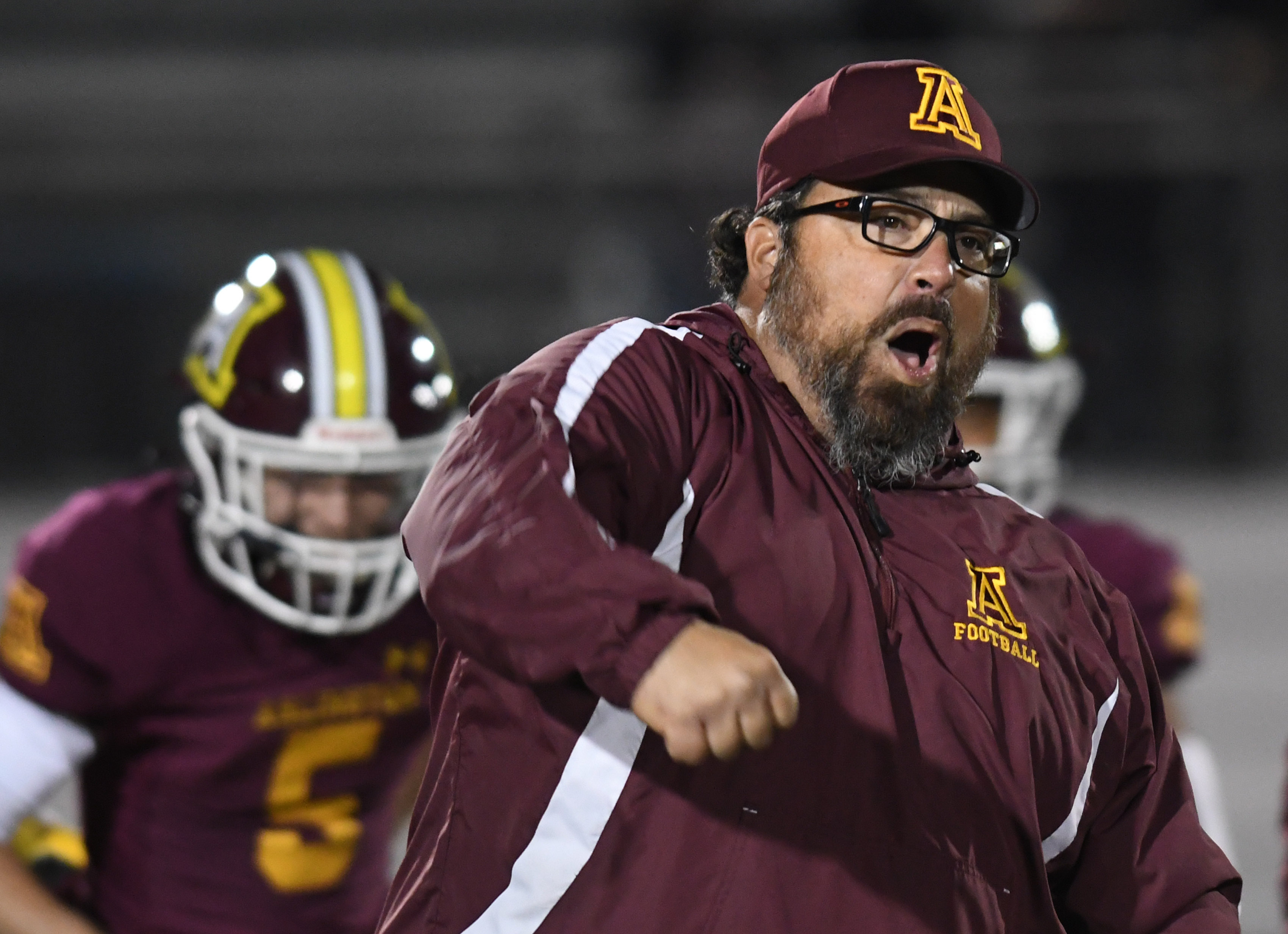 Arlington football writing new chapter about triumphs after years