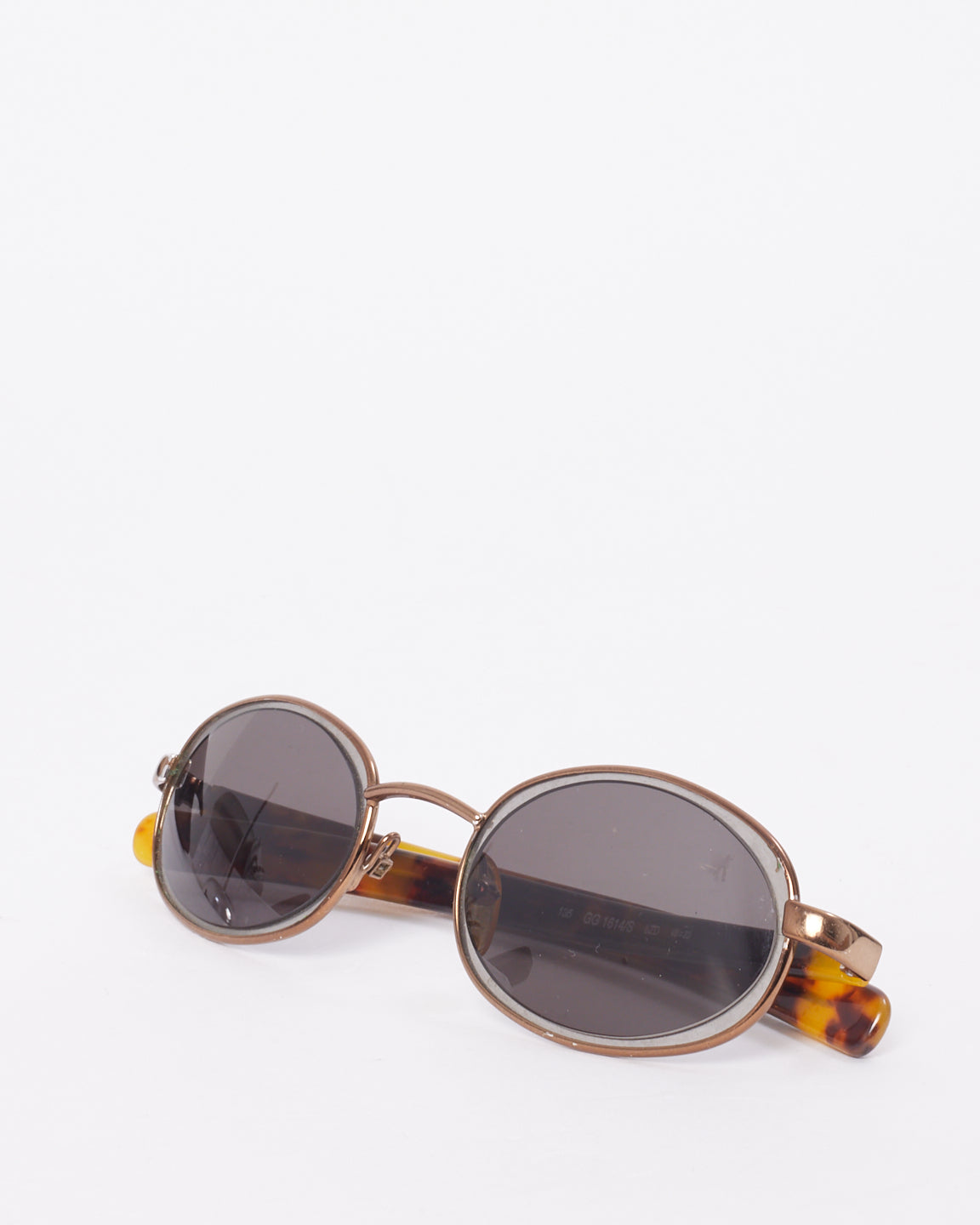 Explore a Gucci Vintage Brown Tortoise Metal GG 1614/S Sunglasses