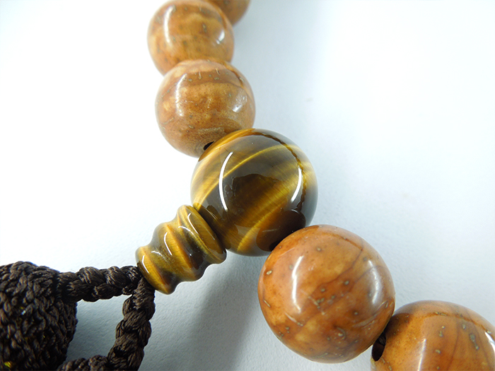 鳳眼菩提樹大玉片手数珠焦茶二五房虎目石仕立 お数珠の安田念珠店へ