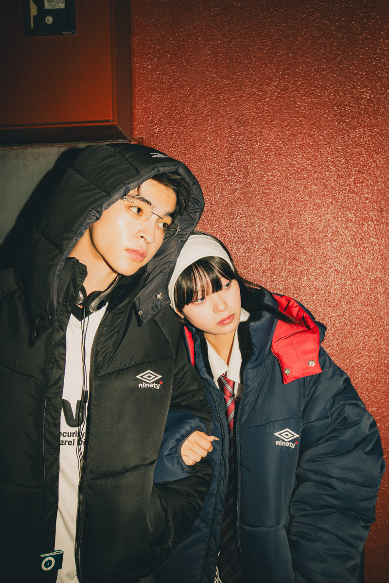 9090 × UMBRO REMOVABLE HOOD PUFFER JACKET (scheduled to be shipped