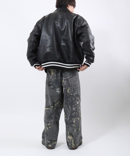 スタジャン グランジテイストなトライバルロゴ刺繍 フェイクレザー