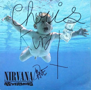 ニルヴァーナのメンバー3人全員のサインが入った『Nevermind』の