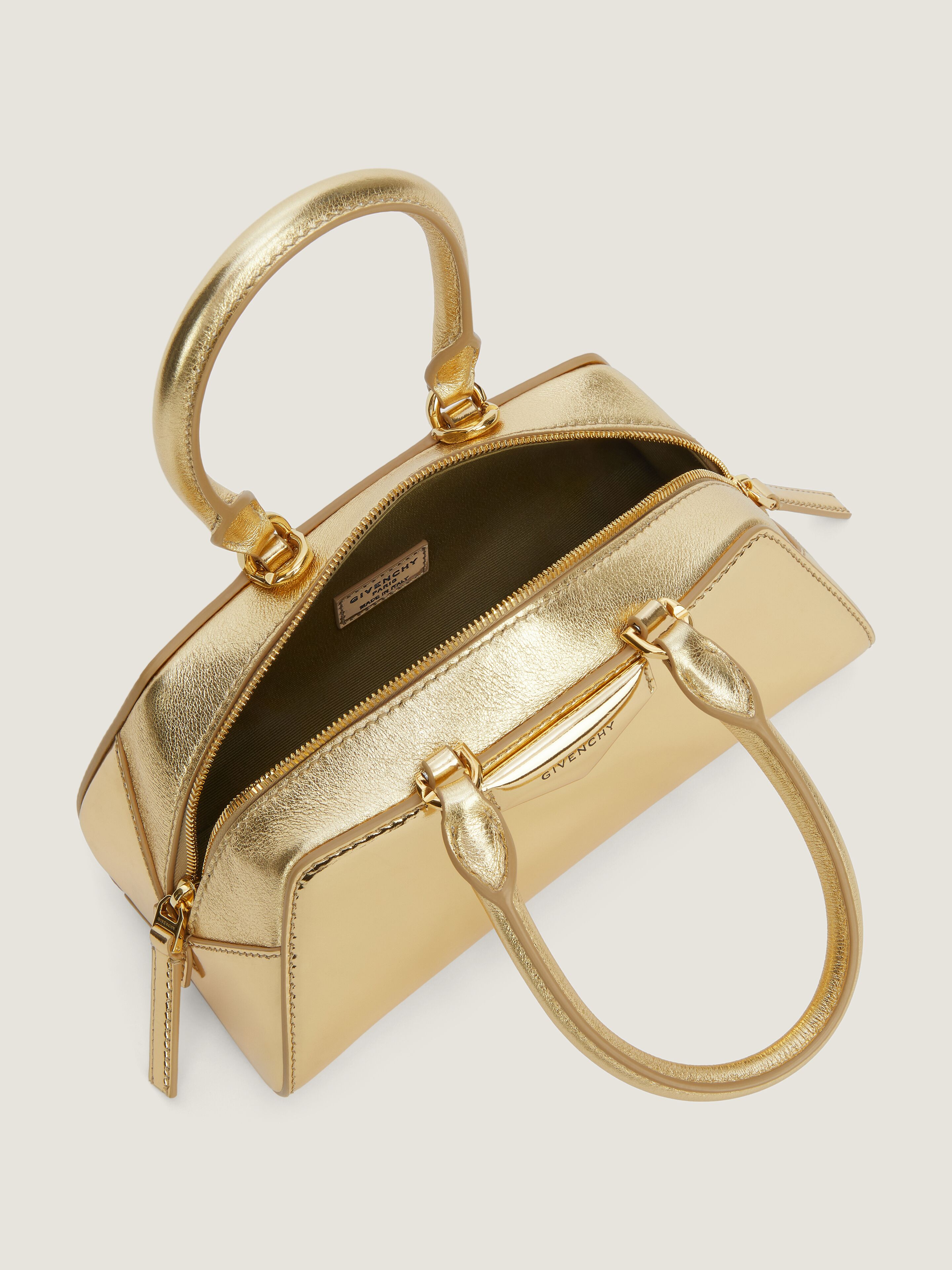 Mini Antigona East-West bag in laminated leather - golden in