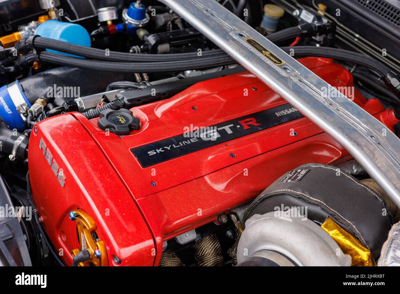 A close-up of Nissan Skyline engine with red valve cover Stock