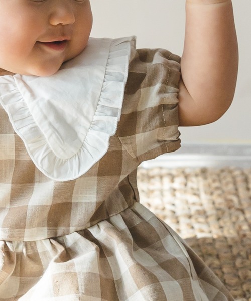 pairmanon（ペアマノン）の「【ベビー】ビッグカラーフリルロンパース