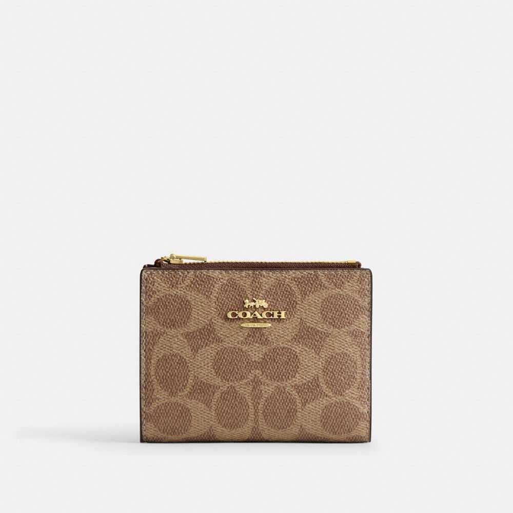 COACH® Outlet | Bifold Wallet In Signature Canvas