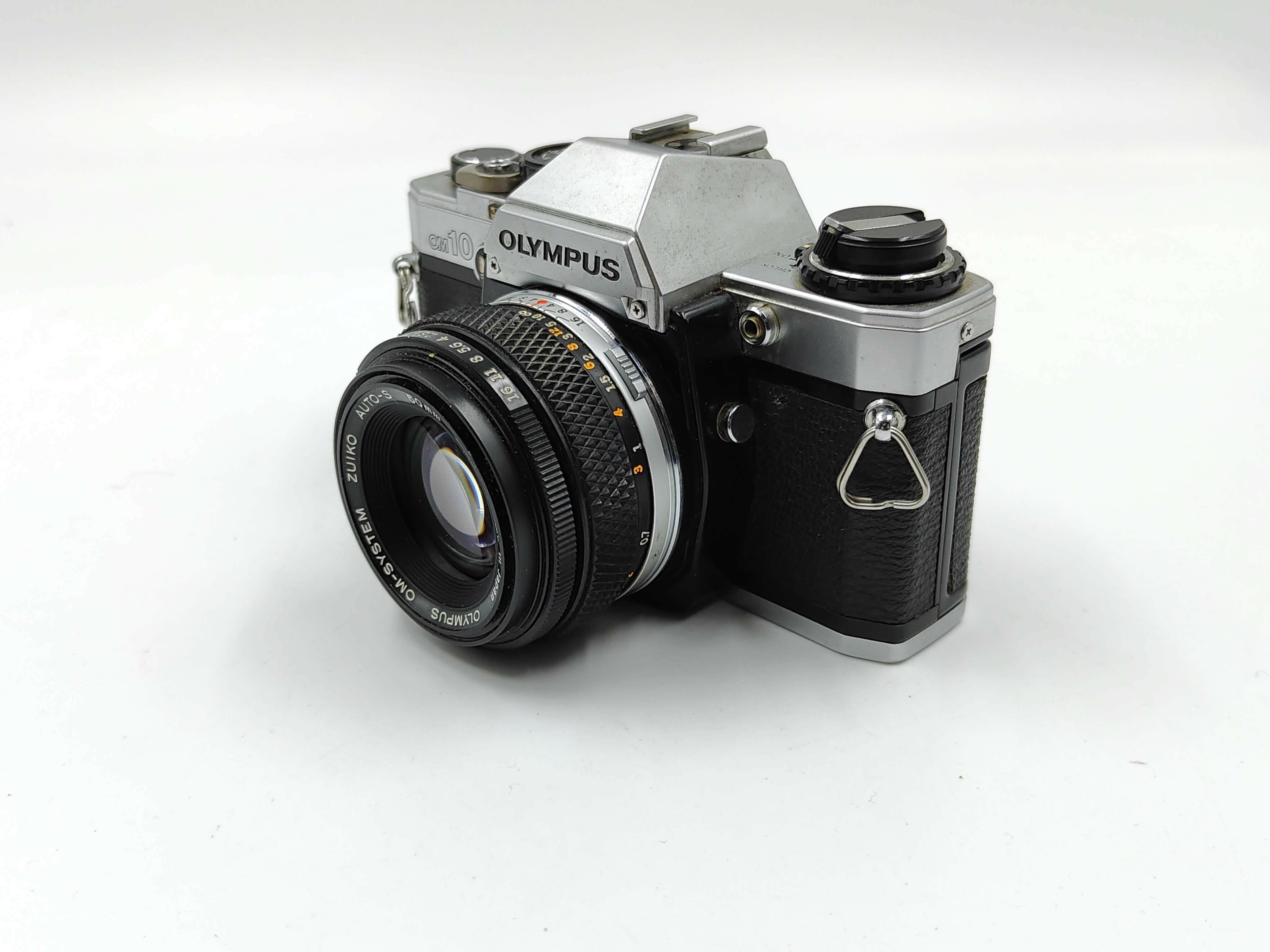 Olympus OM-10 (silver) with 50mm f/1.8 lens | Classic Cameras AU