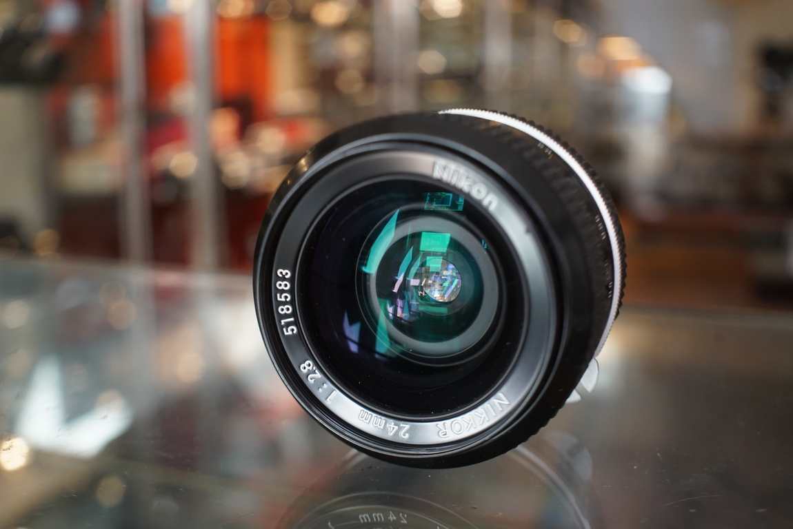 Nikon Nikkor 24mm F/2.8 Pre-Ai lens - Fotohandel Delfshaven / MK