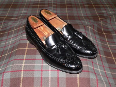 Salvatore Ferragamo 'Mauro' Black Wingtip Tassel Loafers, 426