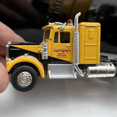 Kenworth W925 With King Trailer And Rock Crusher Load - CORGI