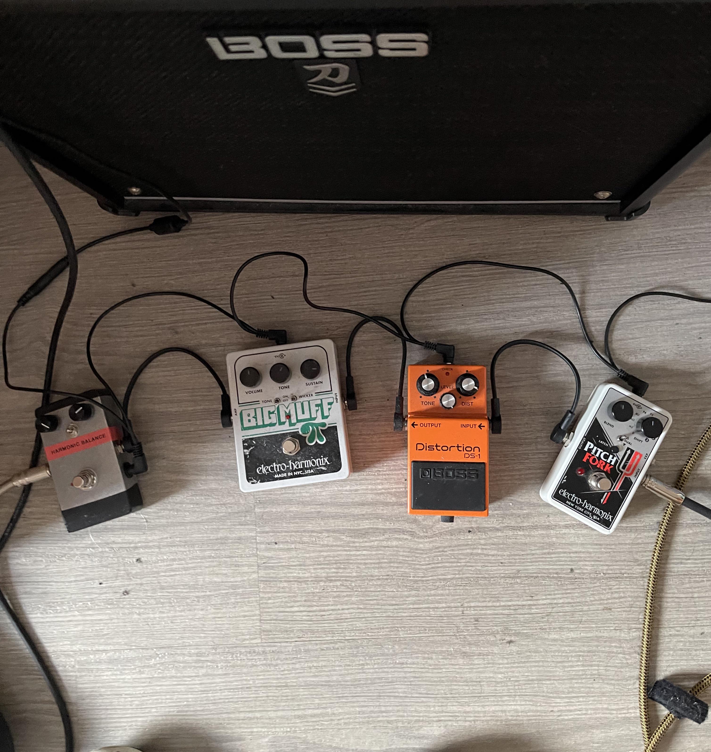 Why can a guitar amp handle a pitch shifted guitar but not a bass