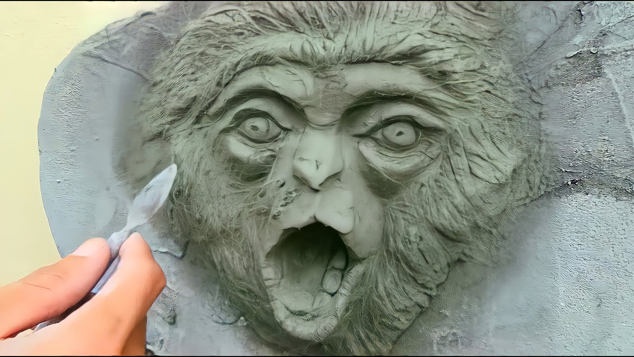 Marvel at creating a lifelike monkey face / sand cement relief