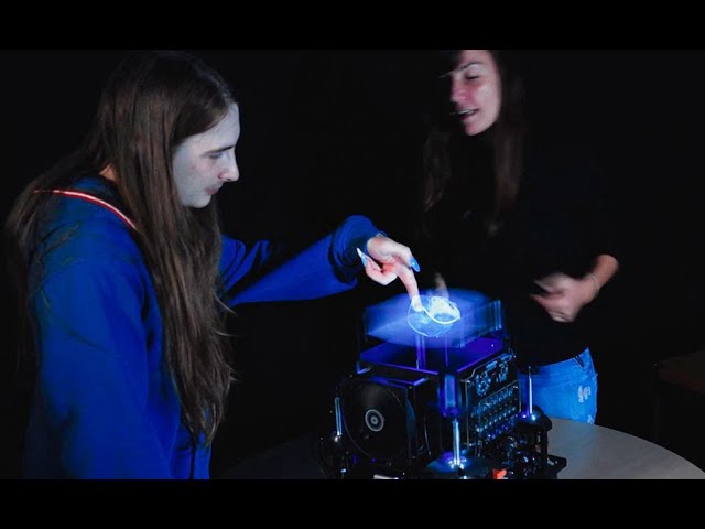 World's first interactive 3D holographic display - YouTube