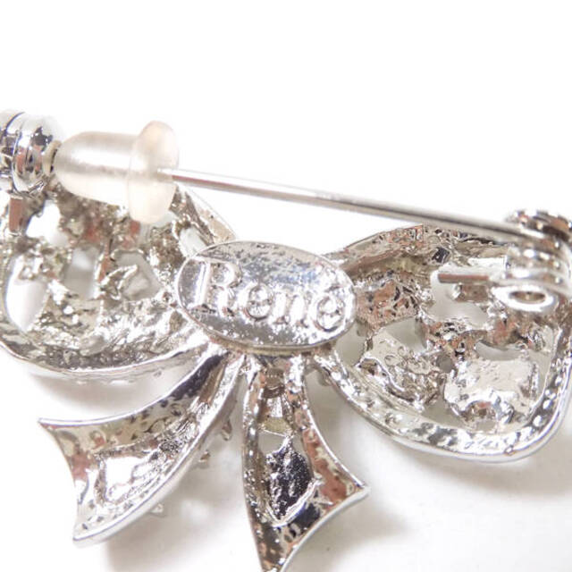 René - 美品 Rene ルネ リボンブローチ シルバー系 ライトストーン