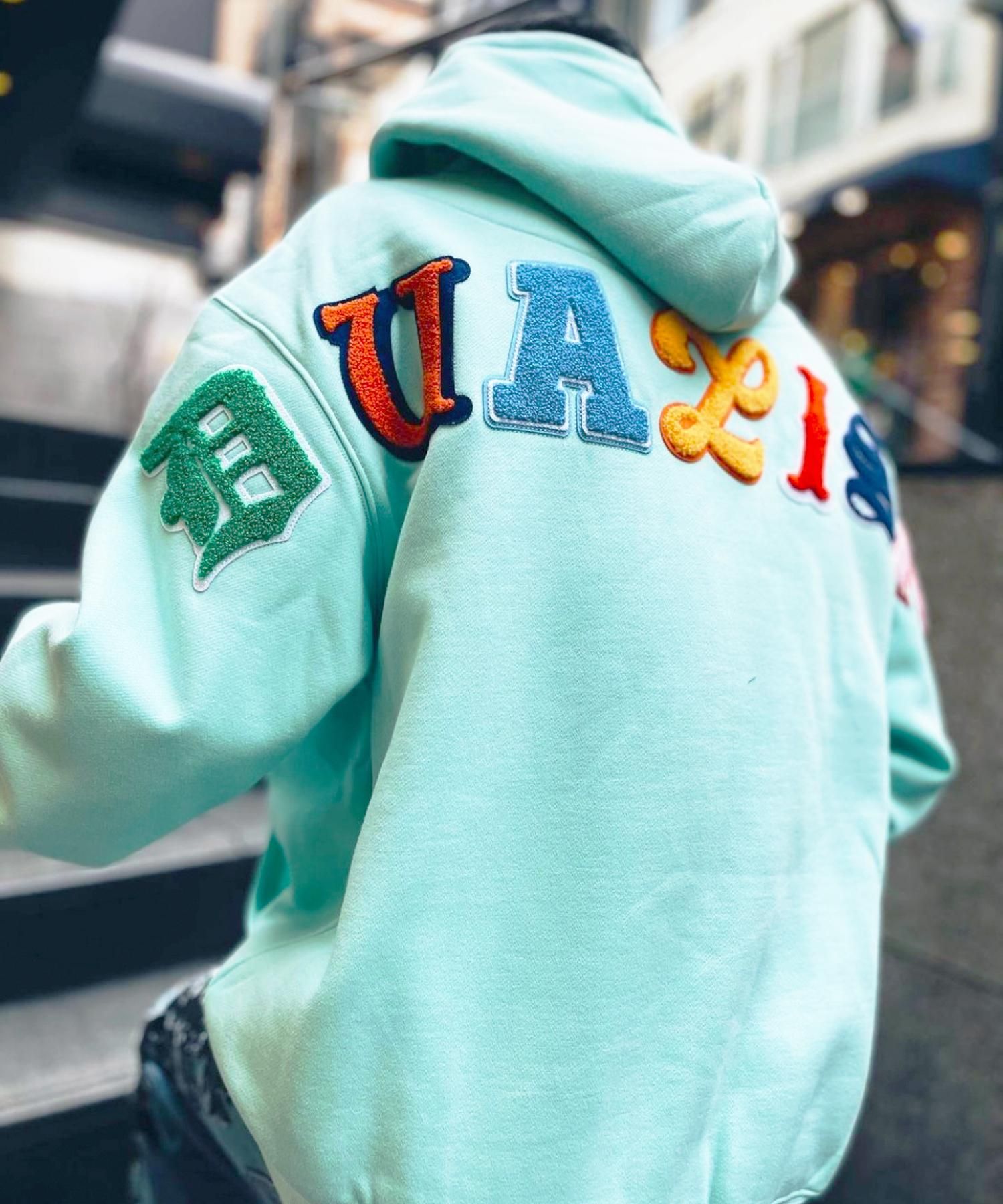 DUALISM/DLSM(デュアリズム) フードパーカー DL MULTI FONT WAPPEN