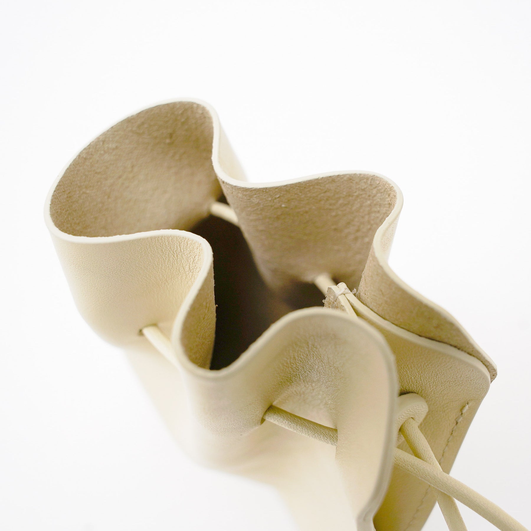 HERRIE KINCHAKU POUCH - XXS / RAPTO FLEX｜レザー ミニ巾着ポーチ 首