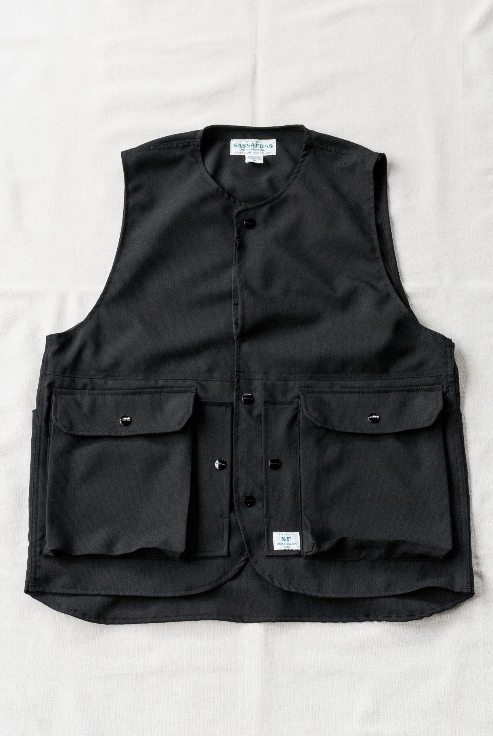 SASSAFRAS Cultivator Vest Wool Like Tropical | kado〔カド オノミチ〕