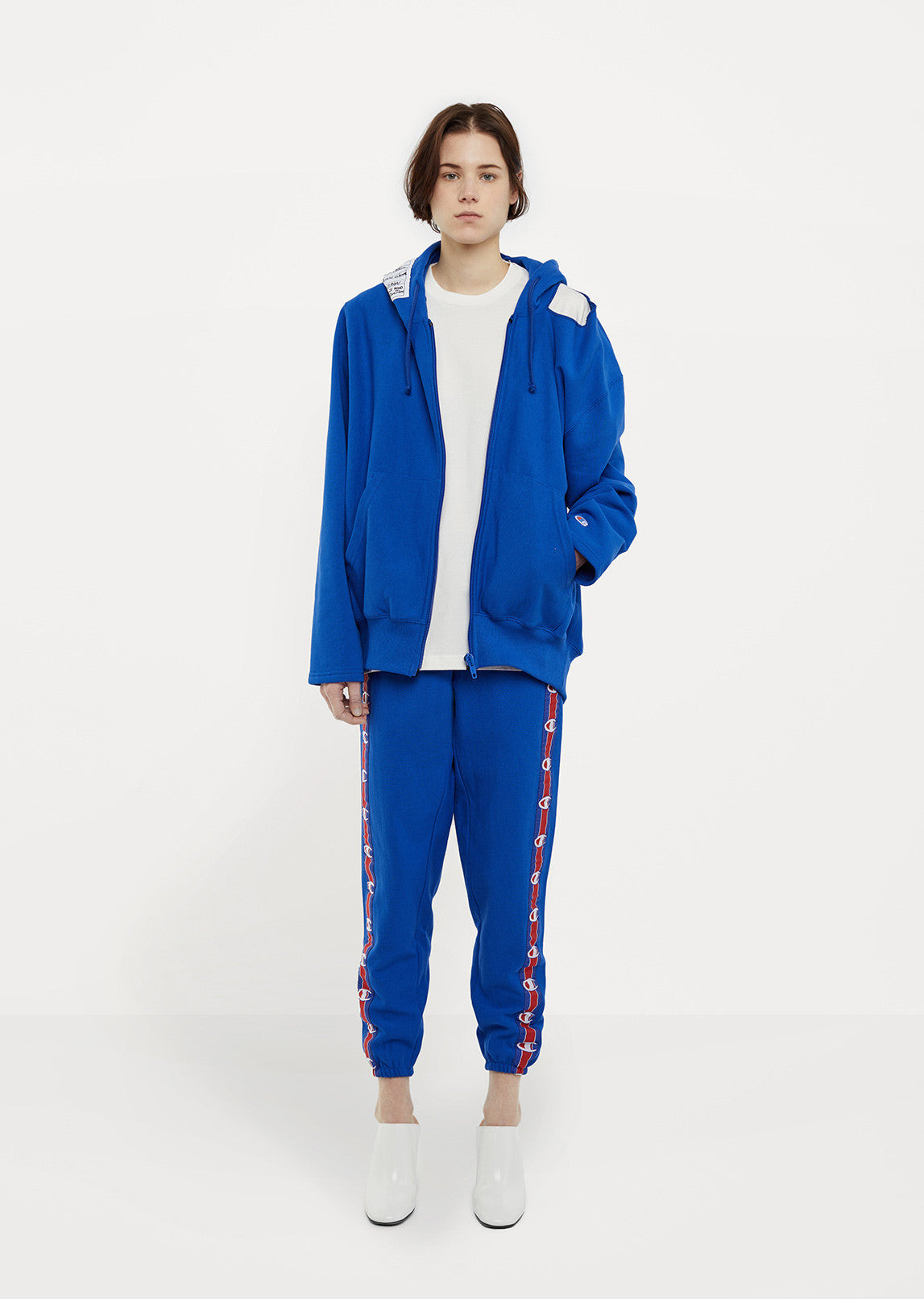 X Champion Zip Up Open Shoulder Hoodie by Vetements - La Garçonne