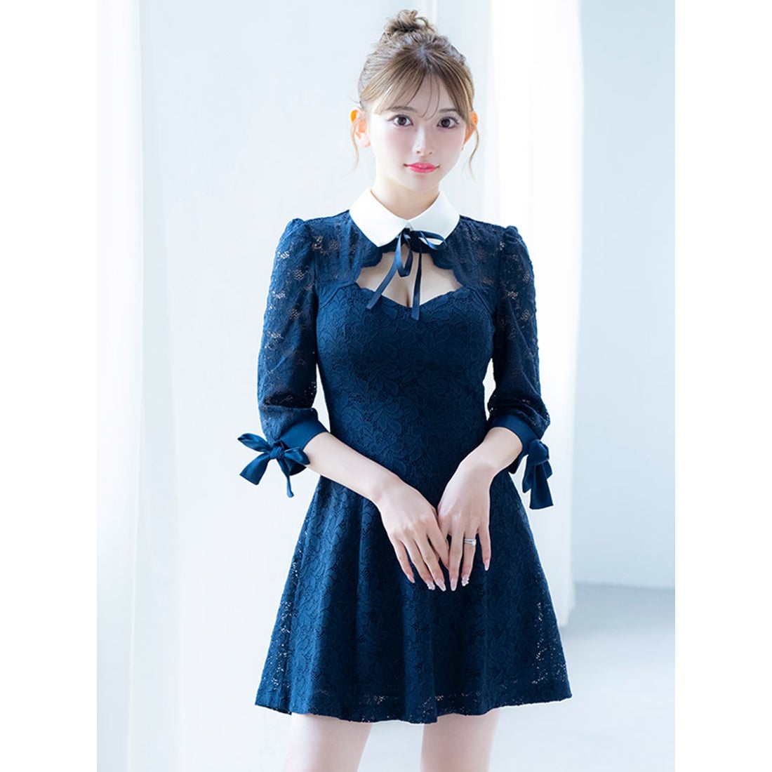 ティカ Tika 襟付きリボンガーリースタイル総レース袖ありフレアミニ