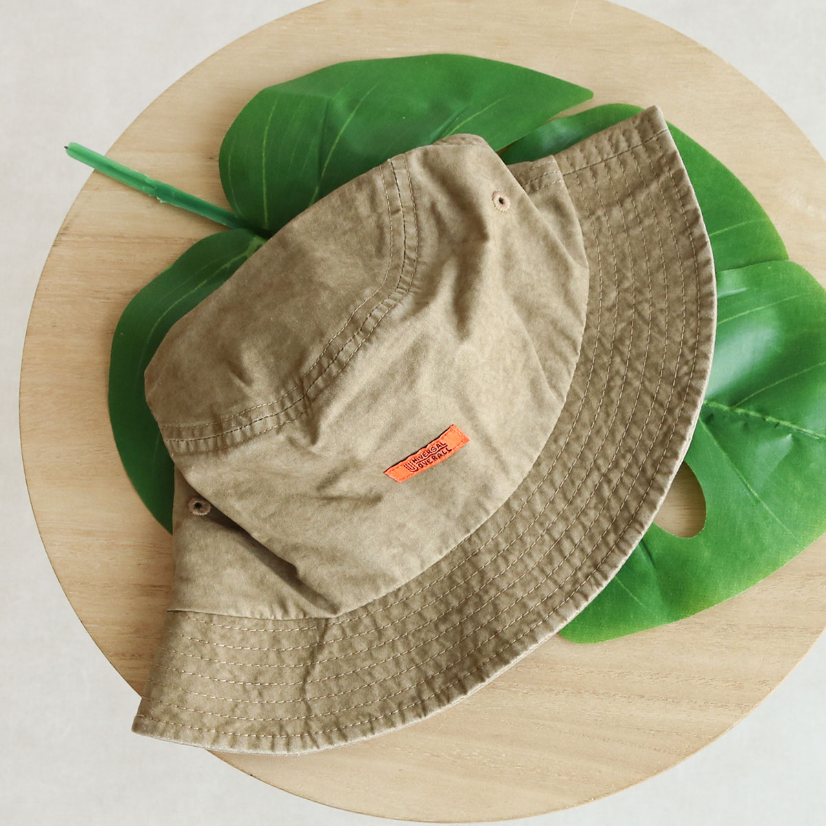 UNIVERSAL OVERALL（ユニバーサルオーバーオール） UO ロゴ