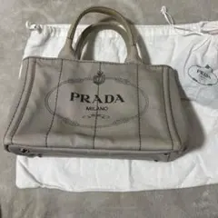2026年最新】prada カナパ ベージュの人気アイテム - メルカリ
