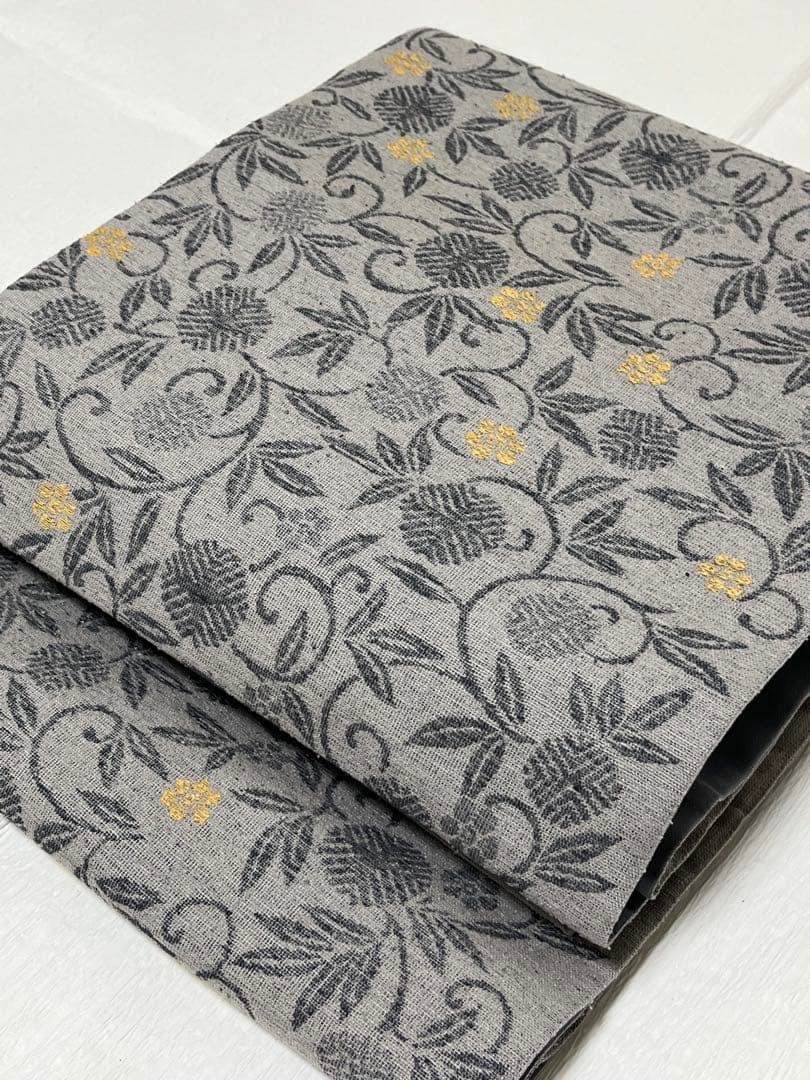 【門間貴美子 】新品未使用　正絹 洒落袋帯 草花唐草文様 錫色グレー 紬調