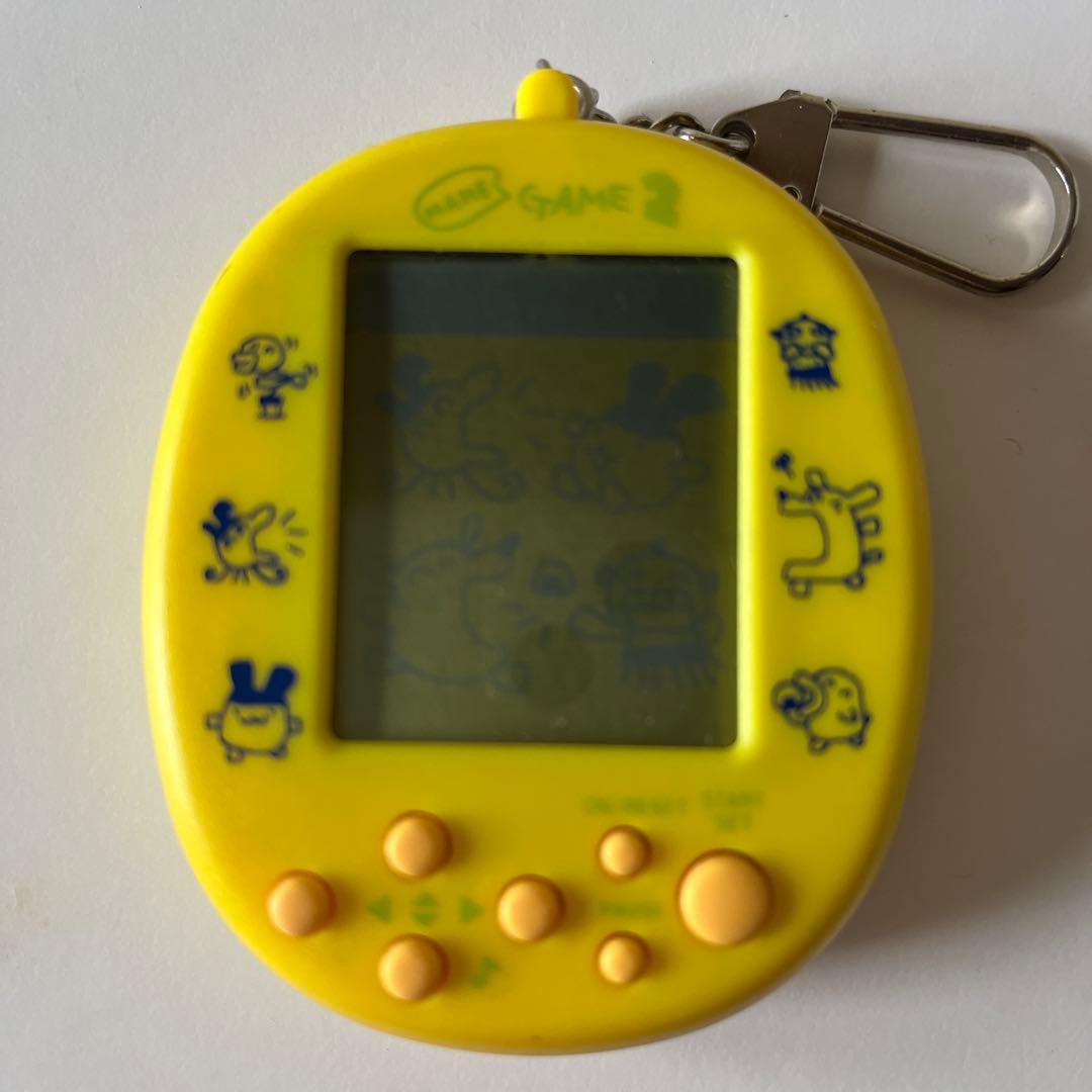 ジャンク品】マメゲームで発見!! たまごっち2 イエロー - メルカリ