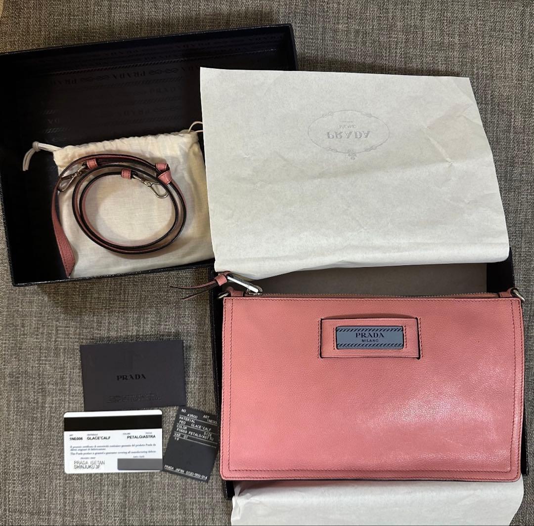 PRADA ピンク レザー ポーチ ストラップ付き - メルカリ