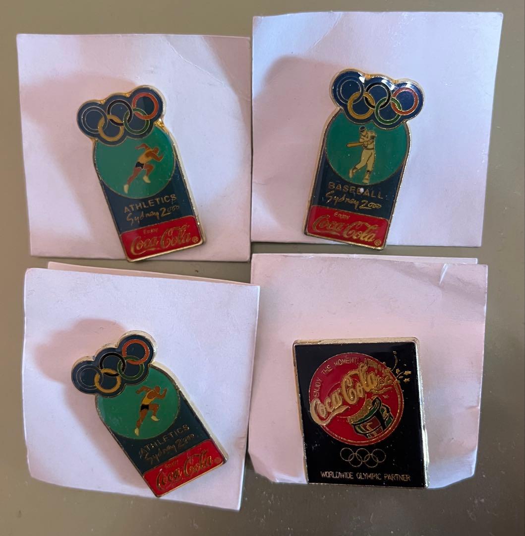 シドニーオリンピック コカ・コーラ ピンバッジ 7個セット6種類 - メルカリ