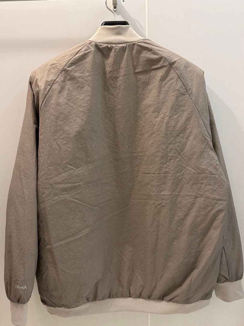 ナンガ ソフトダウンバーシティブルゾン ベージュ - メルカリ