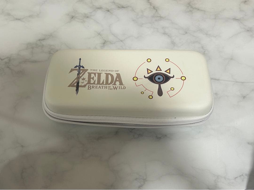 Nintendo Switch本体　ゼルダの伝説ケース付き Amazon.co.jp: 【任天堂純正品】Nintendo Switchキャリングケース
