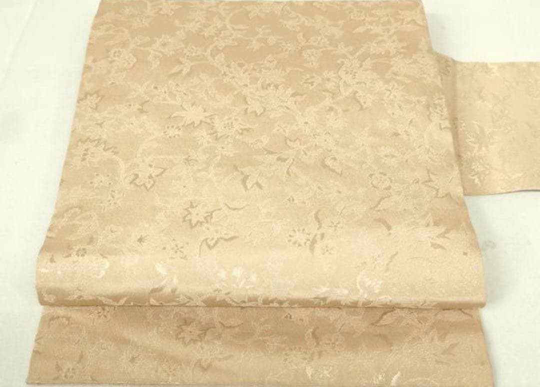 名古屋帯 ベージュ 花柄 絹全通柄九寸名古屋帯 更紗花文 銀糸 正絹