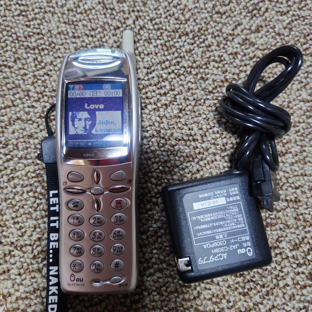 au c501SA シルバー ジョン・レノン 携帯 ジョン・レノン携帯電話 - メルカリ