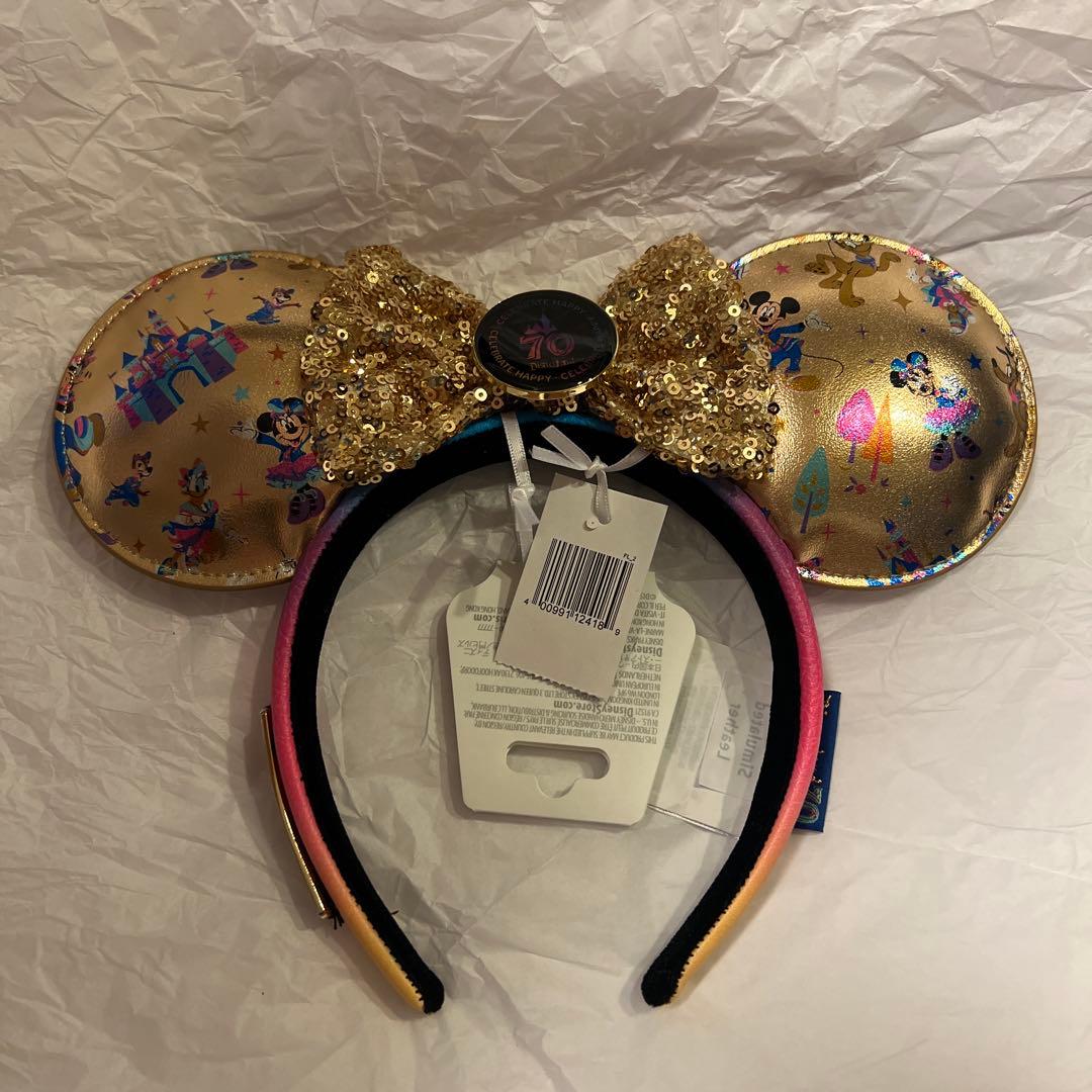 新品！カリフォルニアディズニー 70周年 カチューシャ ゴールド - メルカリ