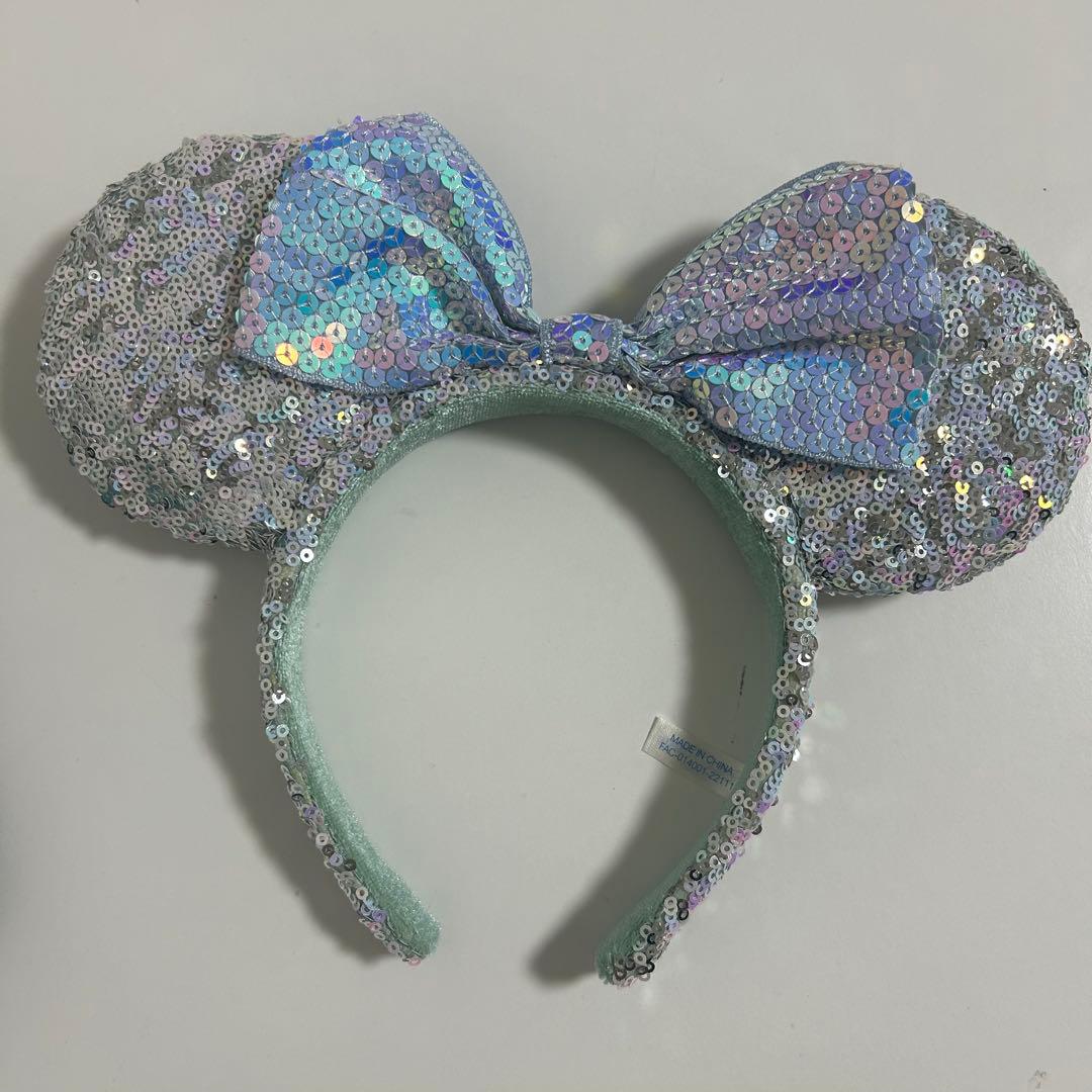 ディズニー カチューシャ スパンコール 水色 オーロラ - メルカリ