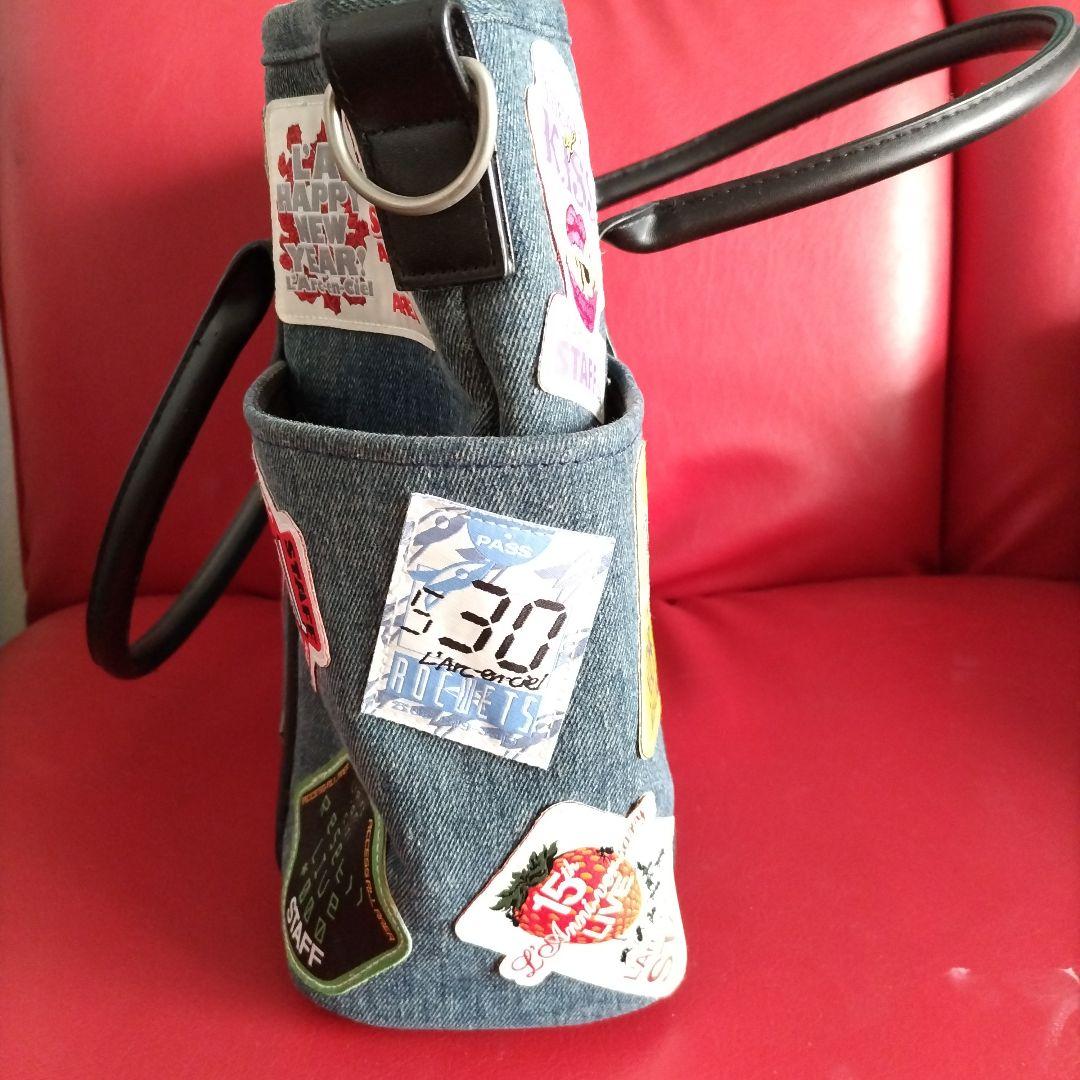 ラルク L' Arc~en~Ciel 25周年ライブグッズ 2wayパスバッグ - メルカリ